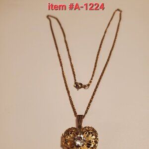 1 Gold Chain Necklace with Gold heart pendant, item # A-1224, wt. 10 grams.